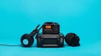 Audio and Video Equipment on a teal background