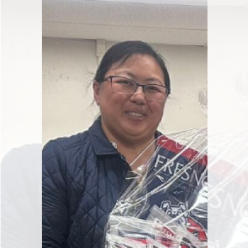 Photo of Vangshoua holding a hamper