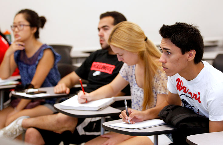 Students taking notes